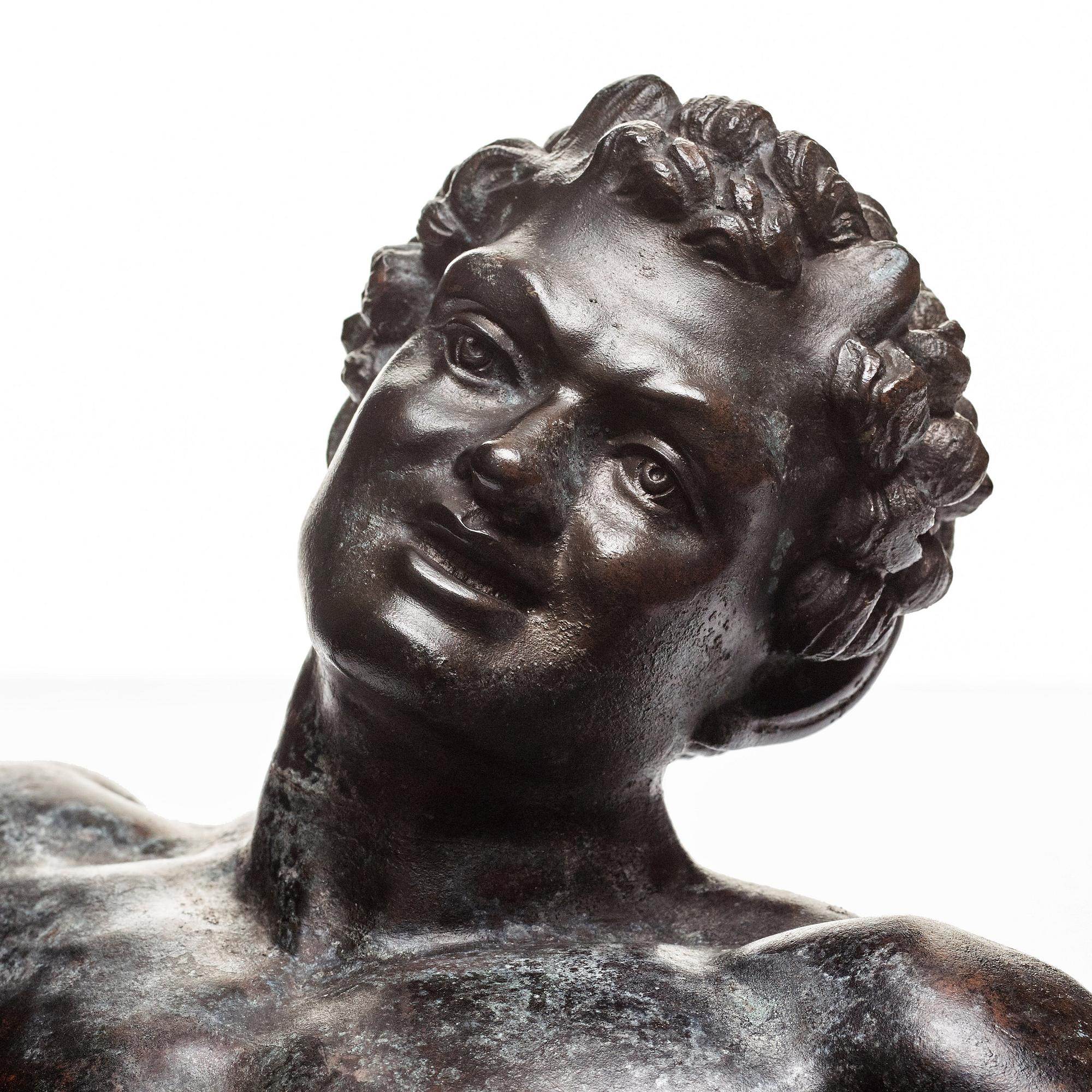 SCULPTURE, probably Italy 18th Century. Satyr with cymbals.