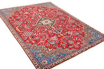 A Kashan carpet, c. 350 x 224 cm.