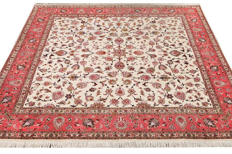An old Tabriz carpet, part silk, 60 raj, c. 253 x 250 cm.