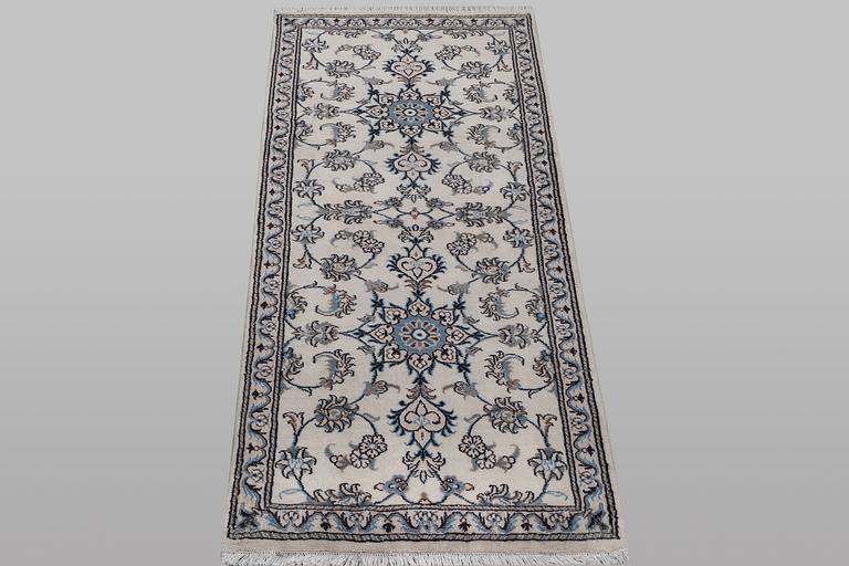 A runner carpet, Nain, part silk, ca 197 x 77 cm.