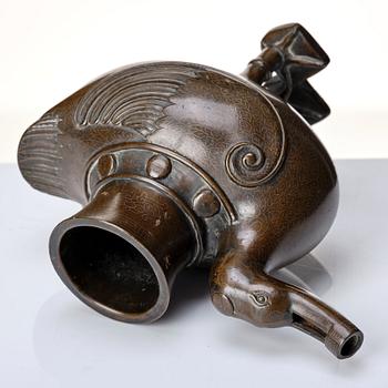 A bronze archaistic duck shaped vessel with silver inlay, Qing dynasty (1644-1912).