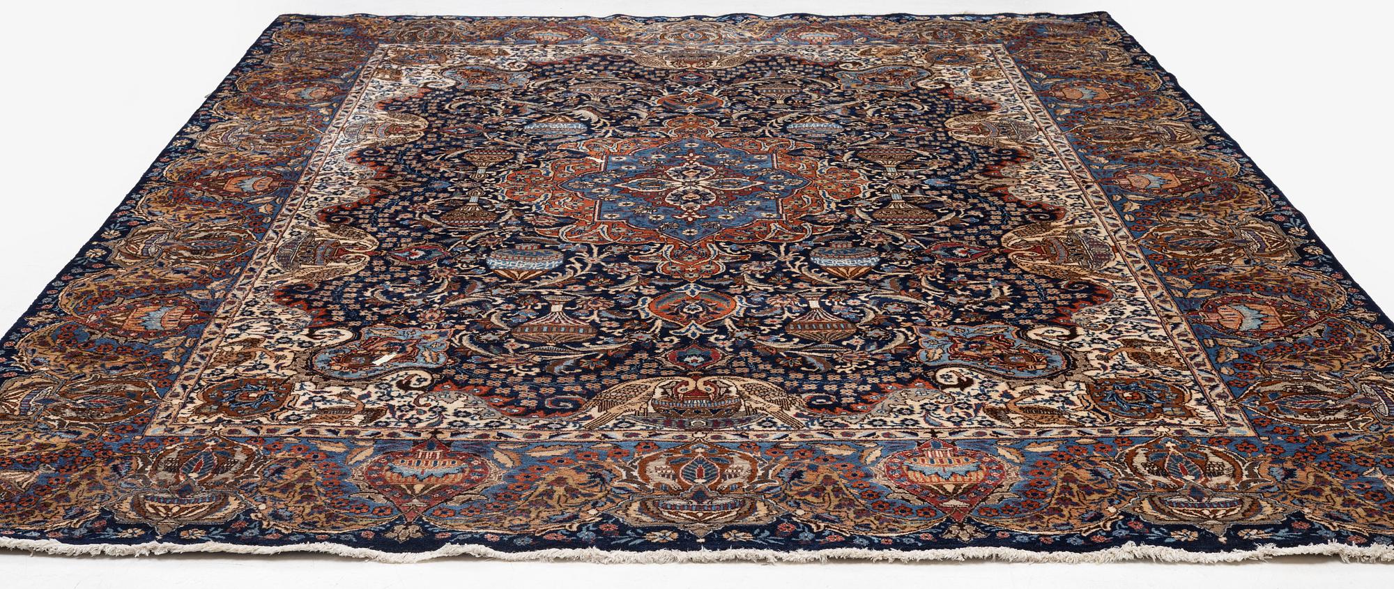 A Kashmar rug, c. 396 x 300 cm.