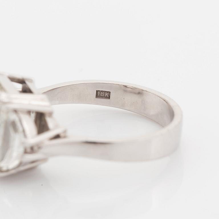 An 18K white gold ring set with a radiant-cut diamond weight 5.02 cts quality H vs2.