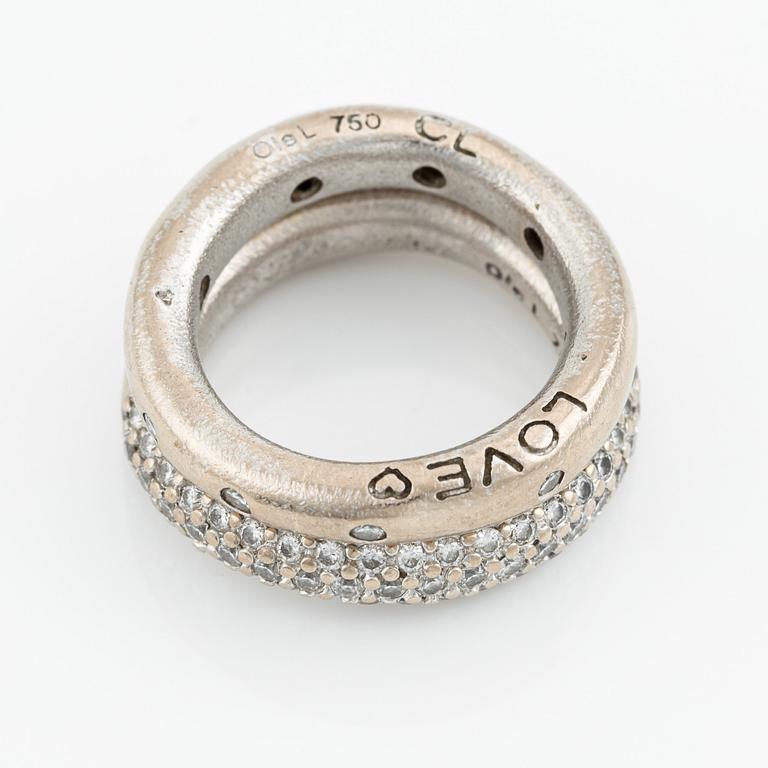 Ole Lynggaard two "Love" rings no. 4 in 18K white gold with round brilliant-cut diamonds.