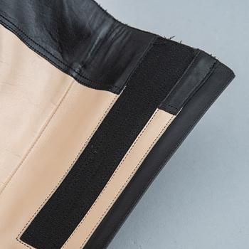 CHRISTIAN LOUBOUTIN, a pair of leather boots, size 37.