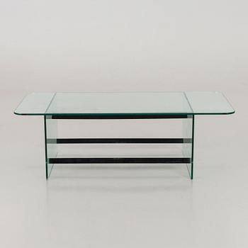 A late 20th century glass table.