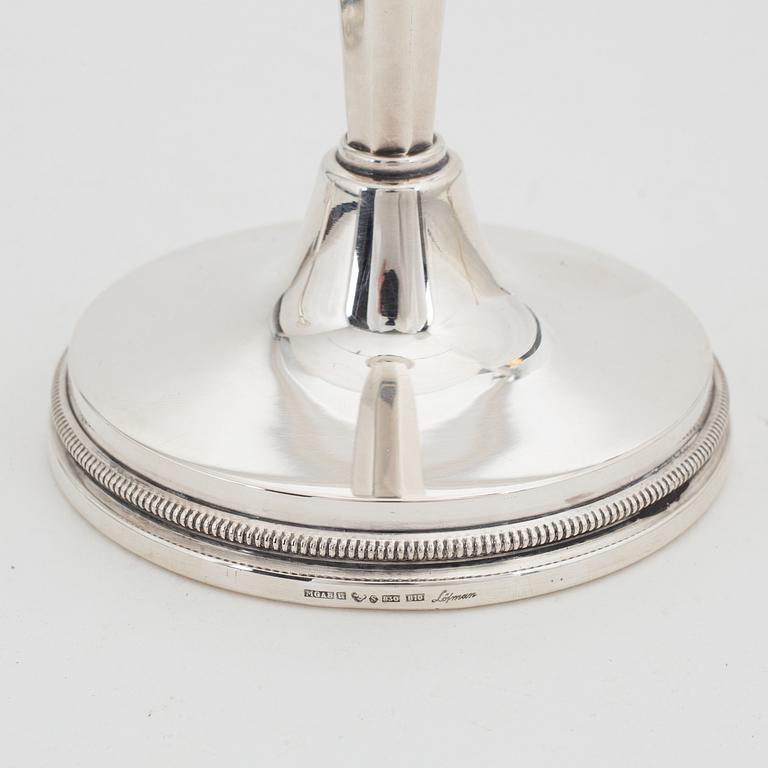 Eric Löfman, a pair of silver candlesticks, MGAB, Uppsala, 1976.
