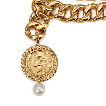 CHANEL, a necklace.