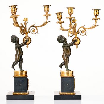 A pair of late Gustavian candelabra.