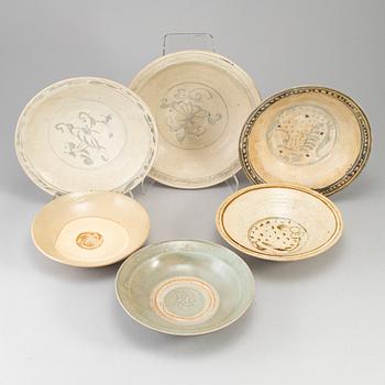A group of six ceramic dishes, Southeast asia, presumablue 15th, also 19th century.