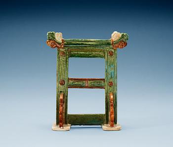 1659. A green and brown glazed pottery stand/gate, Ming dynasty (1368-1644).