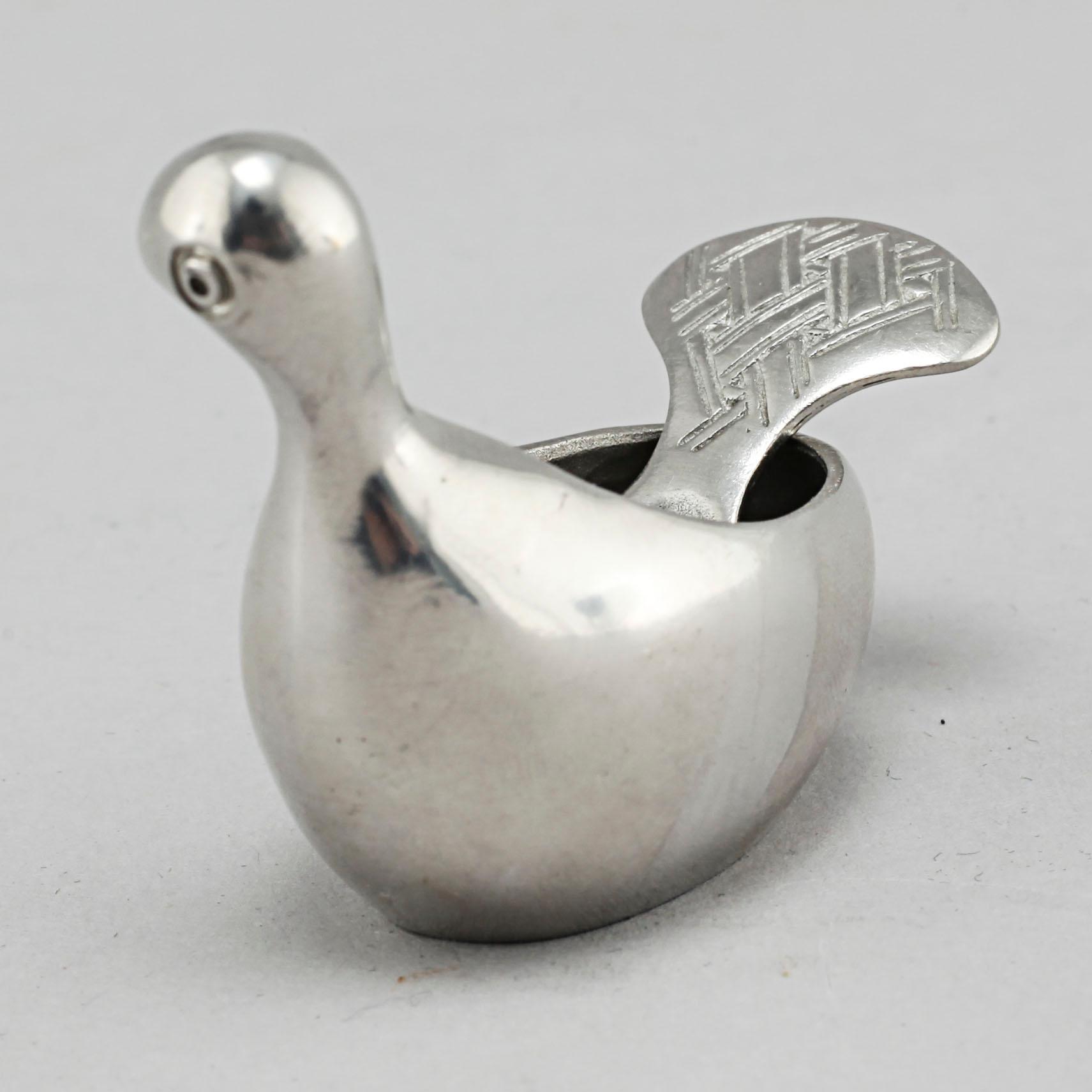 A "Kirun" salt bowl with spoon in pewter, made by Lars Pirak, second half of the 20th century.