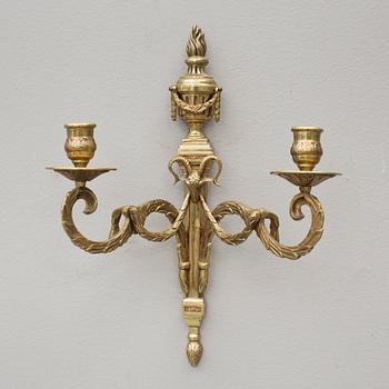 APPLIQUER, ett par, mässing, Louis XVI-stil, 1900-talets första hälft.