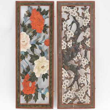 A set of two Japanese wooden panels, early 20th Century.