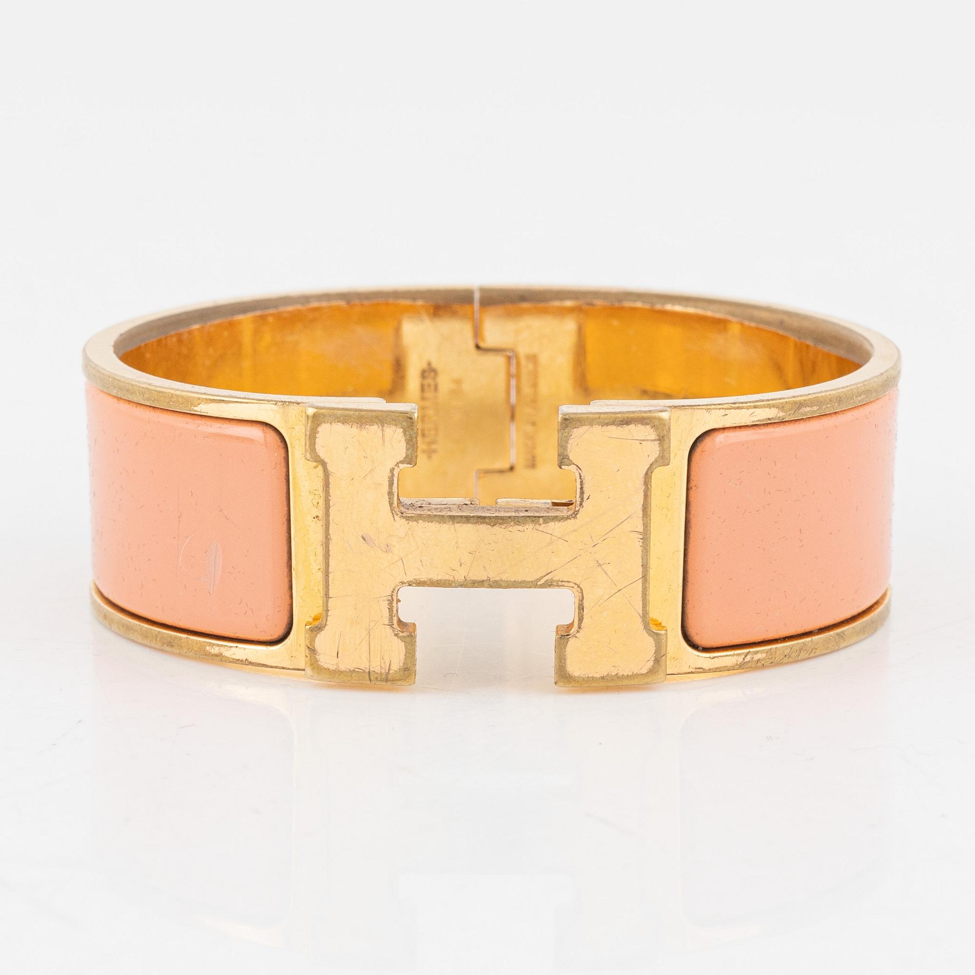 Hermès, a 'Clic Clac H' bracelet.
