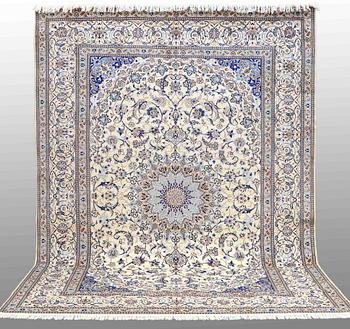 A carpet, Nain part silk s.k 9LAA, ca 355 x 260 cm.