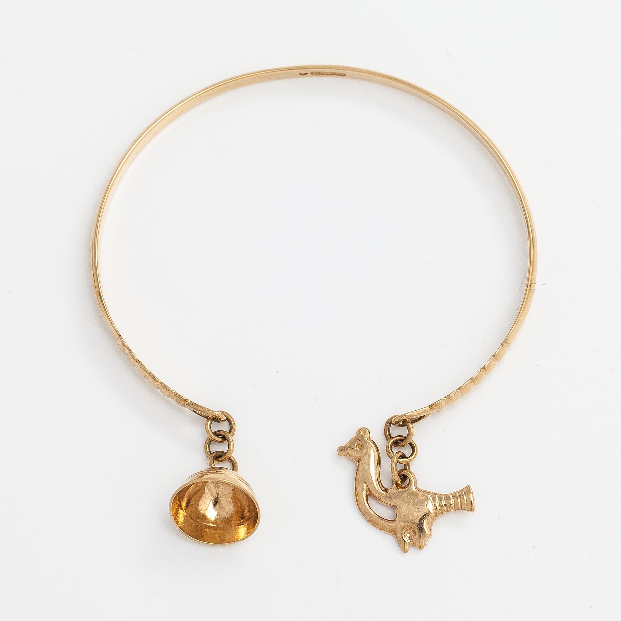 Armband "Linten fågel", 14K guld. Kalevala Koru, Helsingfors 1998.