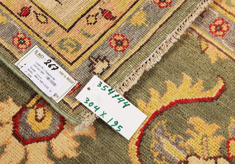 A Kazak carpet, c. 304 x 195 cm.