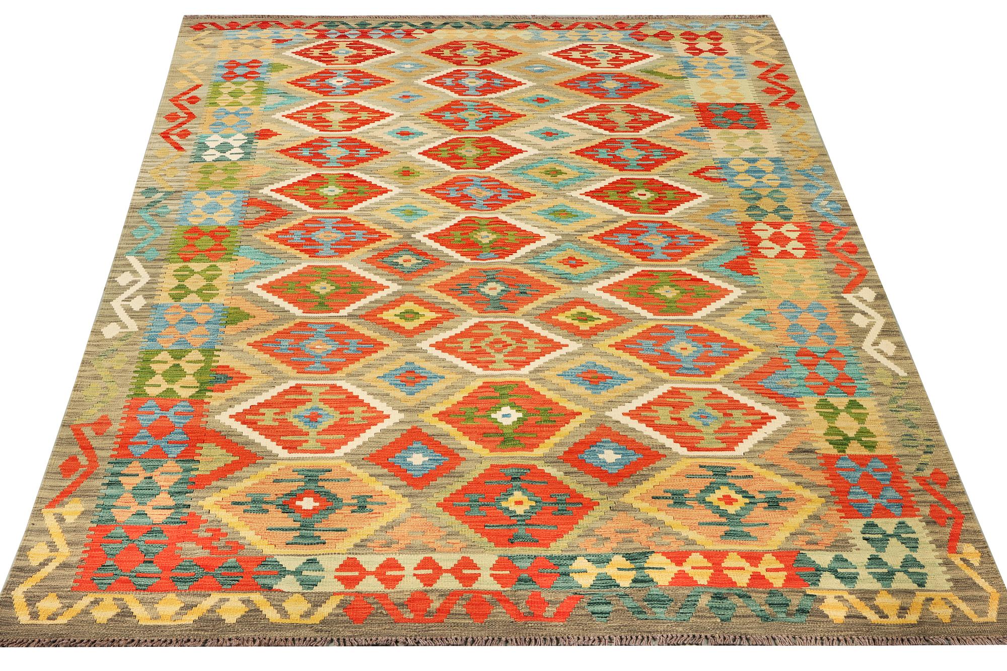 An Afghan Kilim carpet, c. 305 x 200 cm.