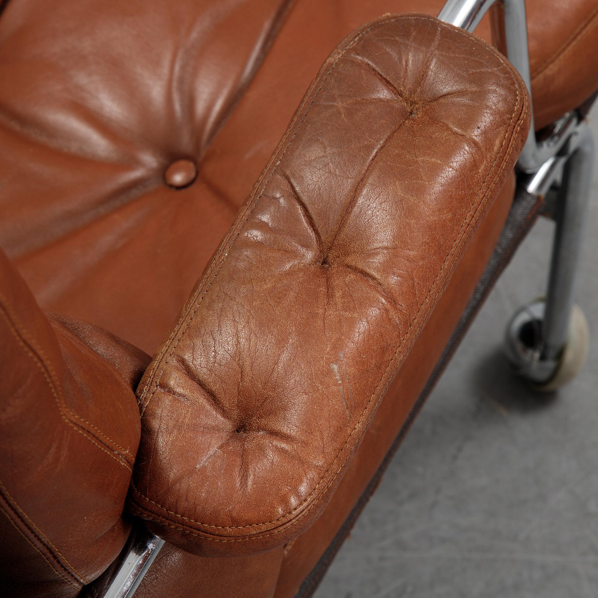 A pair of 'Karin' easy chairs by Bruno Mathsson for Dux, designed 1969.