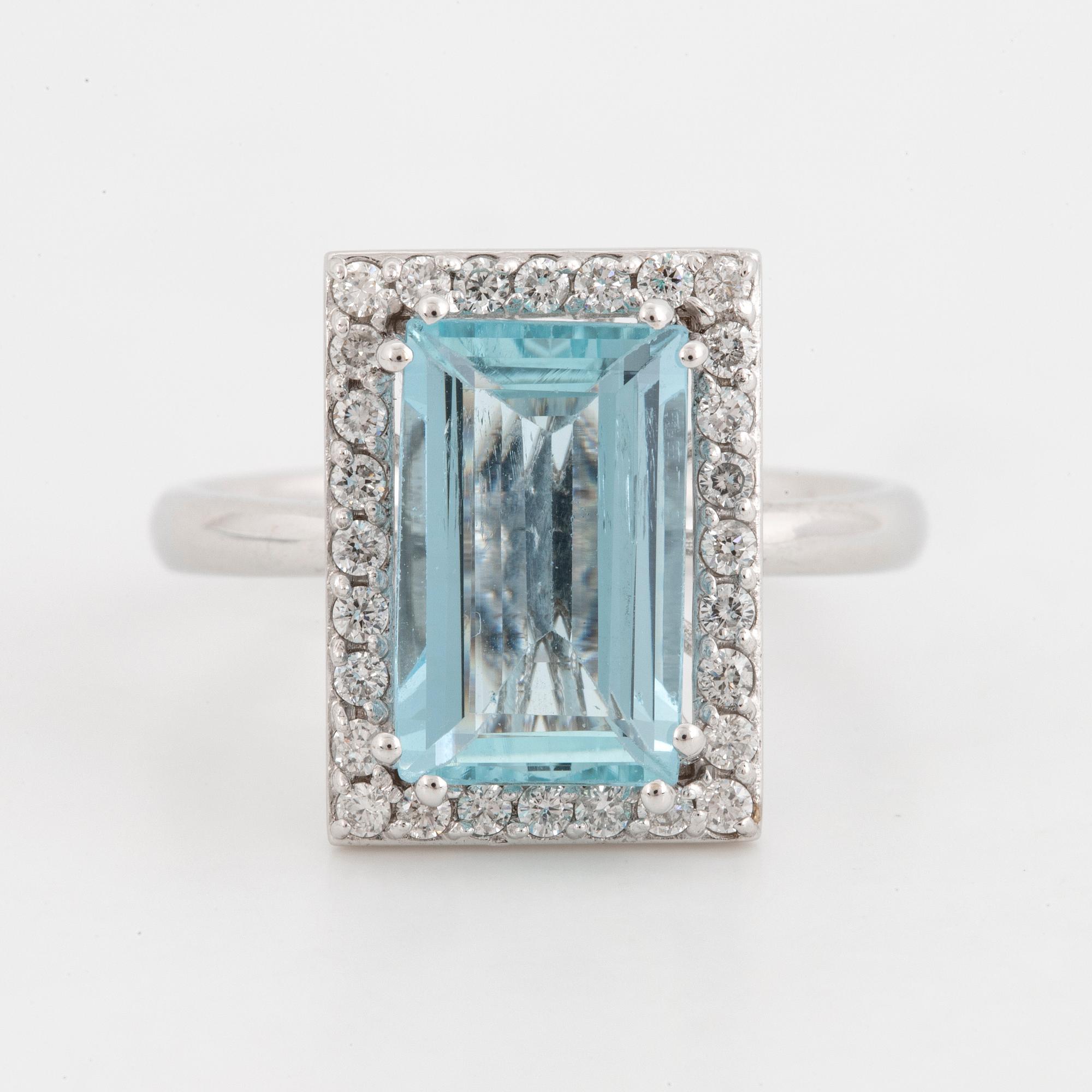 Aquamarine and brilliant-cut diamond ring.
