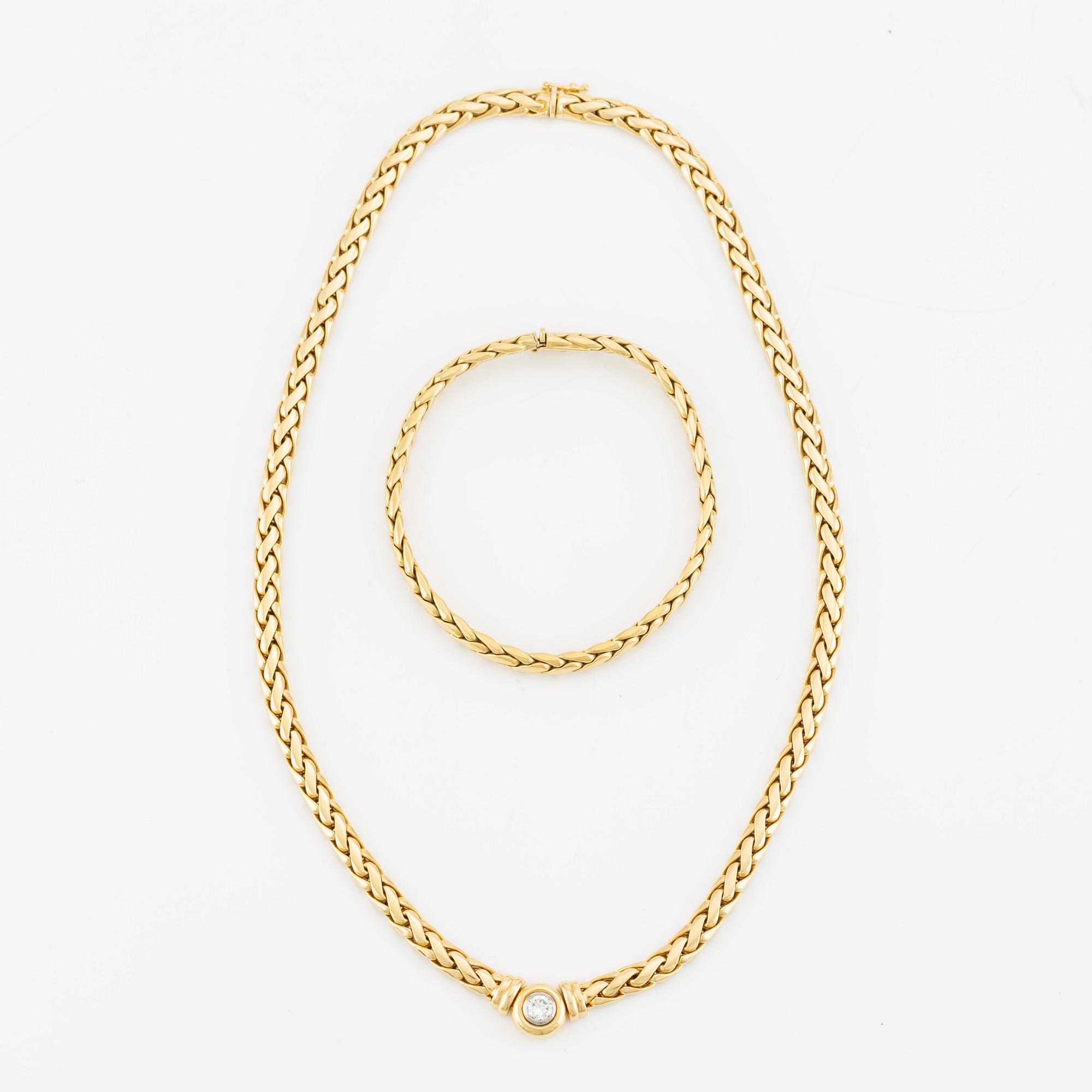 Collier/armband med en rund briljantslipad diamant ca 0.35 ct.