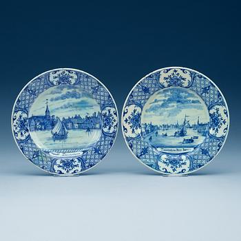 A pair of Delft faience topographical dinner plates, 18th Century.