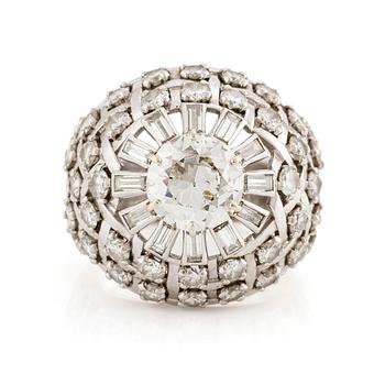 560. A platinum ring with an old-cut diamond ca 1.90 cts ca I/J i.