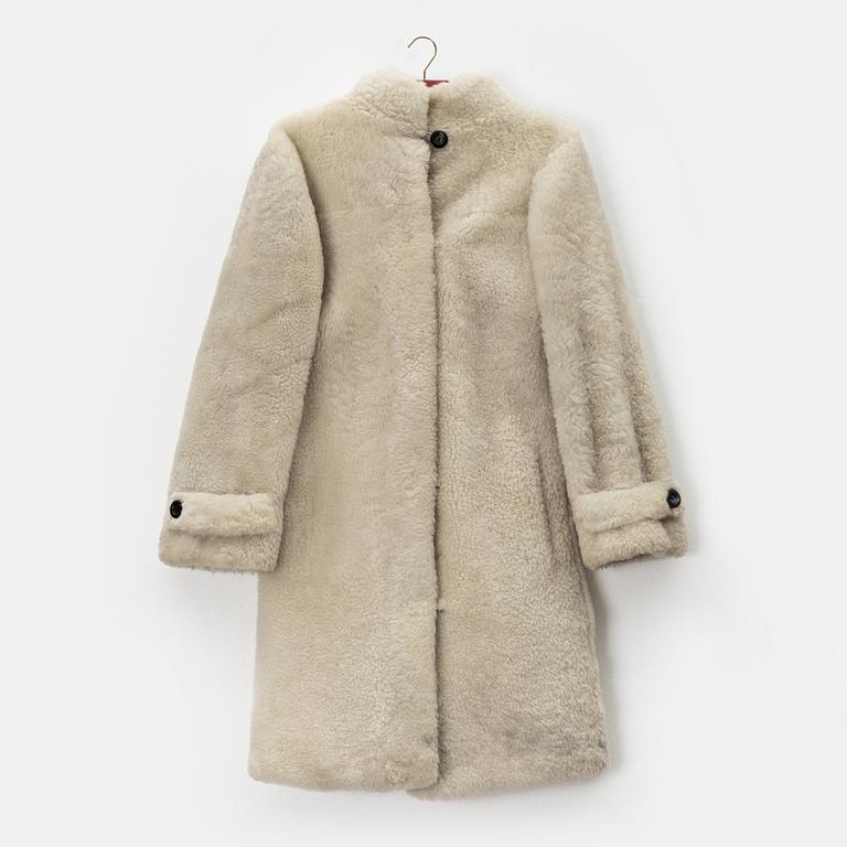 Yves Saint Laurent, kappa, storlek ca M.