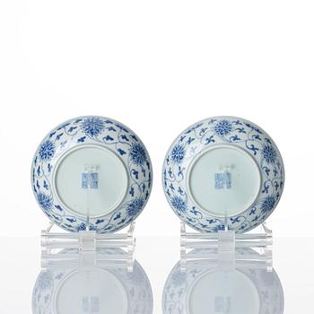 A set of nine blue and white lotus dishes, Qing dynasty with Daoguang seal mark.