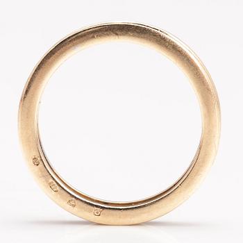 A 14K gold ring with diamonds ca. 0.21 ct in total. Timantttiset, Helsinki 2002.