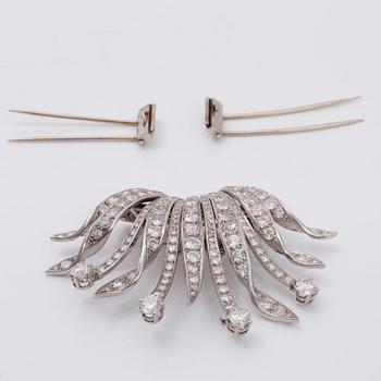 BROSCH/KLÄDCLIPS med biljant- samt gammalslipade diamanter totalt ca 9.50ct.