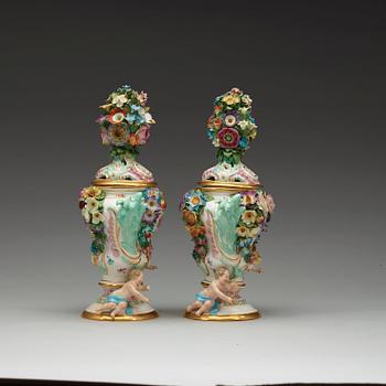 A pair of Meissen pot-purri jars with covers, 19th Century.