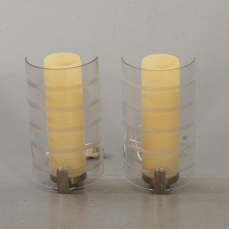 A pair of Swedish Art Deco wall lamps.
