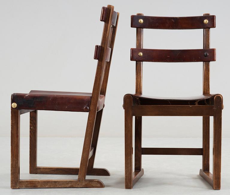 A set of five Axel Einar Hjorth 'Funkis' brown leather and stained wood chairs, Nordiska Kompaniet, Sweden ca 1930.