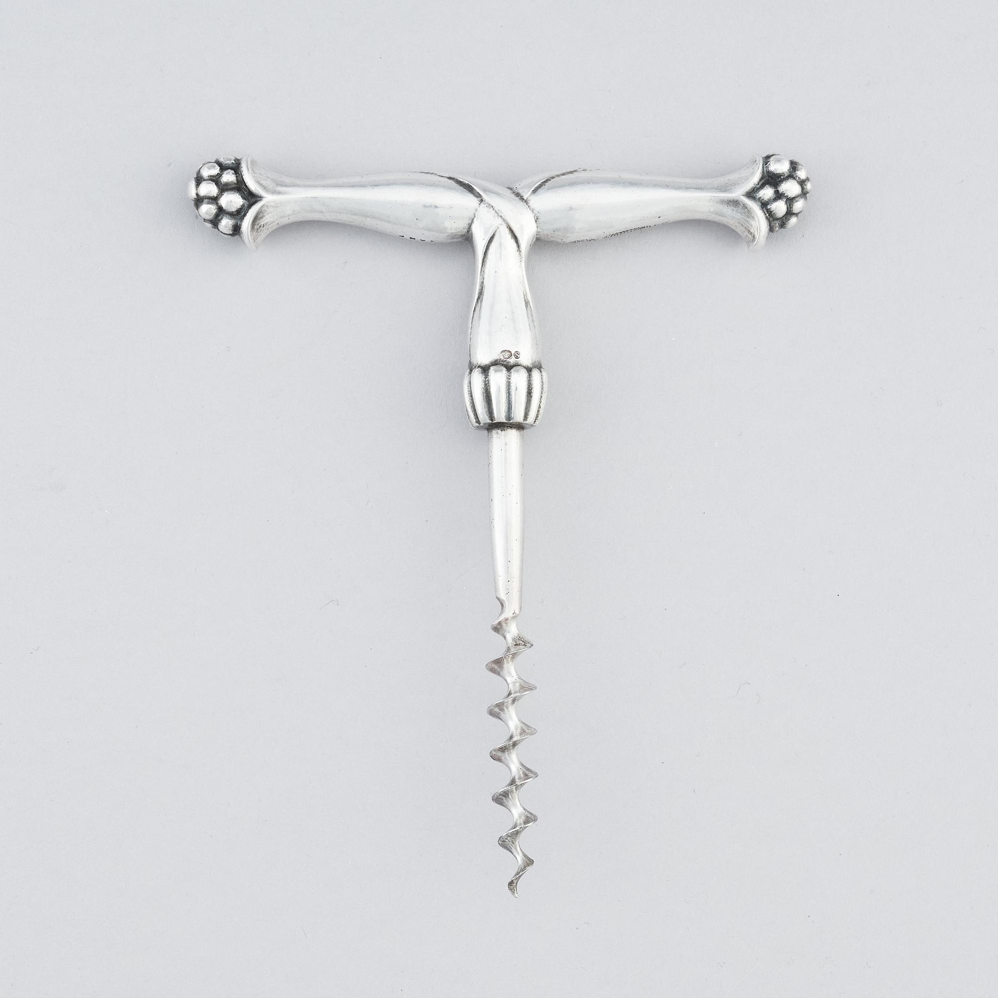 Georg Jensen, an 830/1000 silver corkscrew, Copenhagen ca 1915-1919, Swedish import marks GAB F, design nr 89 (blurred).