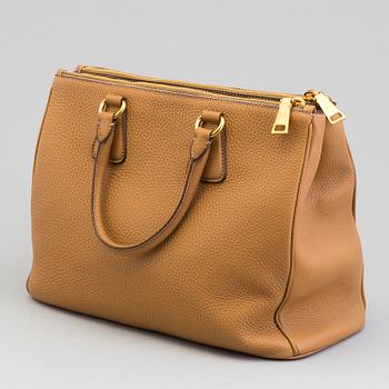 A Prada bag in vitello daino leather.