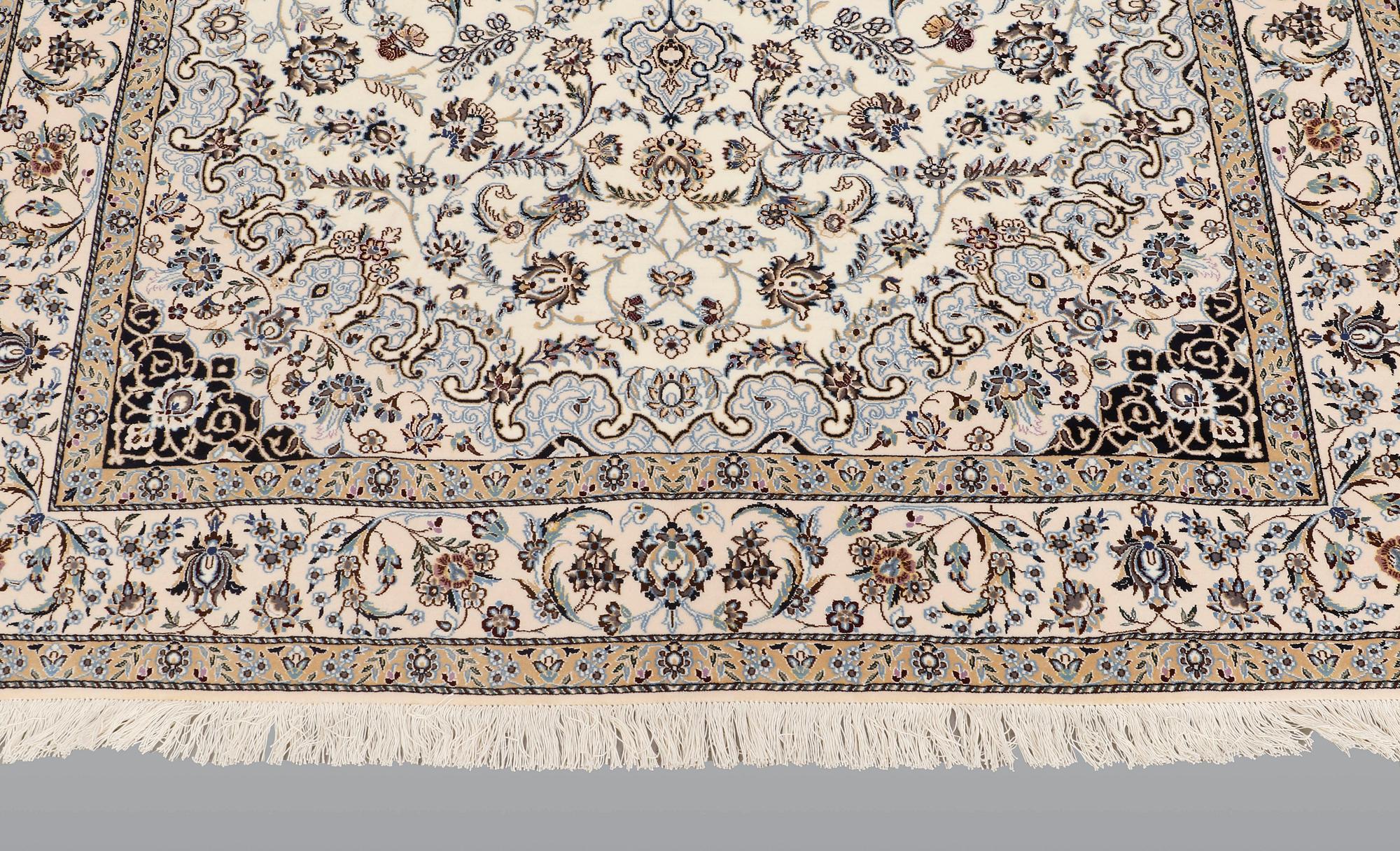A carpet, Nain part silk so called 6 LAA, signed, ca 240 x 137 cm.