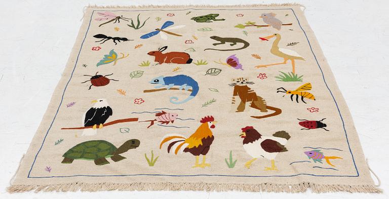 A hand-embroidered Kelim carpet, c. 200 x 147 cm.