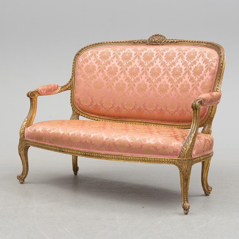 a rococo-style sofa from around 1900.