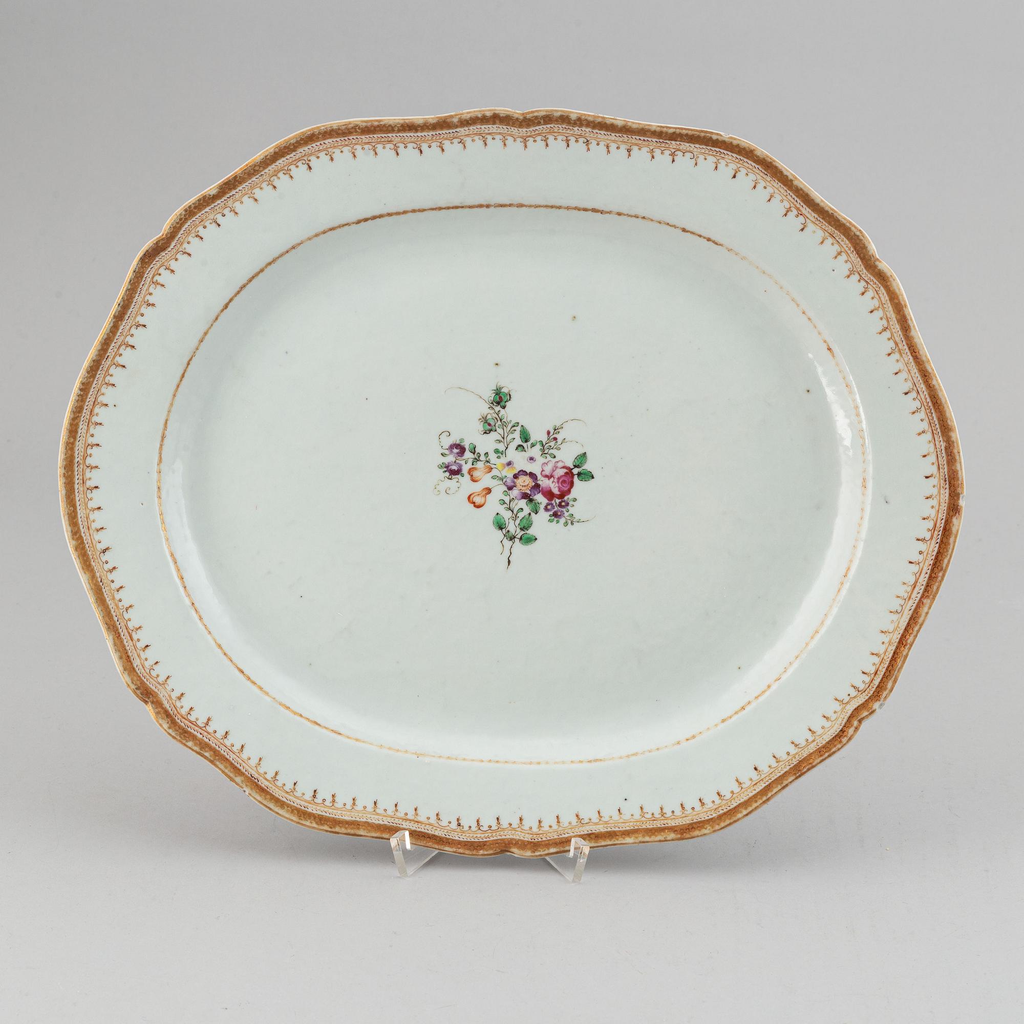 Two famille rose serving dishes and a sauce boat, Qing dynasty, Qianlong (1736-95).