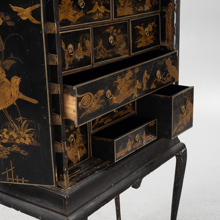 A Cabinet, on a stand, 19th century.