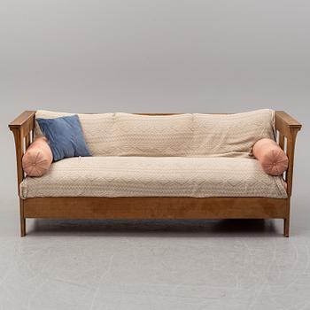 A eary 20th Century pine sofa attributed to Carl Westman.