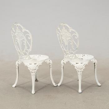 Garden table, Byarum late 20th century and chairs.