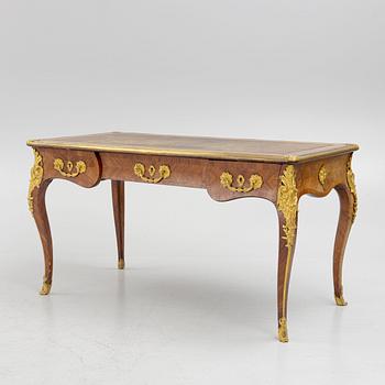 A French Napoleon III Louis XV-style parquetry and gilt bronze-mounted desk, second half of the 19th century.