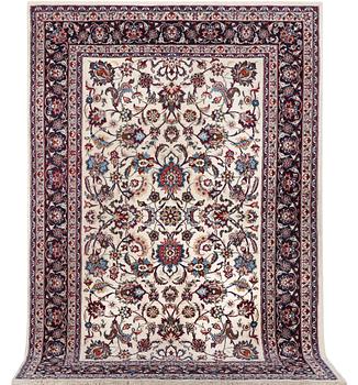 A carpet, Sarouk, part silk, c. 294 x 167 cm.