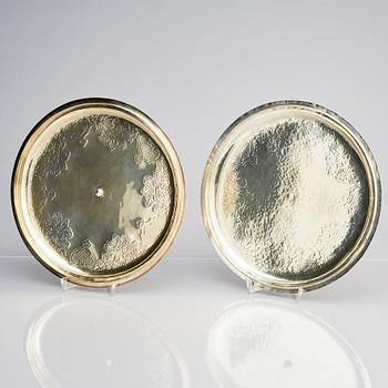A pair of Swedish parcel-gilt silver bowls with covers, mark of S.A.Ackland, 1953 and 1963.