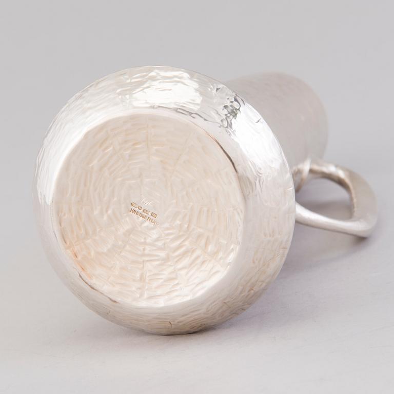 TAPIO WIRKKALA, a sterling silver pitcher and six beakers for Kultakeskus Hämeenlinna 1973.