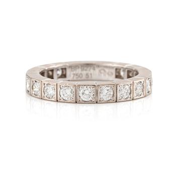 522. An 18K white gold Cartier ring set with round brilliant-cut diamonds.