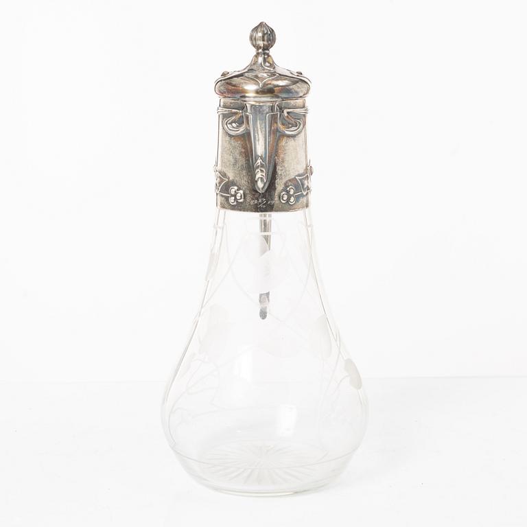A silver and glass Art Nouveau claret jug, David Andersen, Stockholm, 1901.